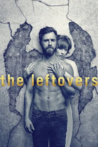 The poster features a shirtless man and a young boy standing against a cracked, gray background. The title "the leftovers" is prominently displayed in bold, golden letters. The mood is somber and mysterious, suggesting themes of loss or abandonment.