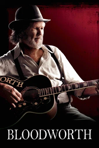 A rugged musician in a hat plays an acoustic guitar against a deep red backdrop, evoking a gritty, cinematic atmosphere. The poster's bold typography and dramatic lighting suggest a story of raw emotion and storytelling.