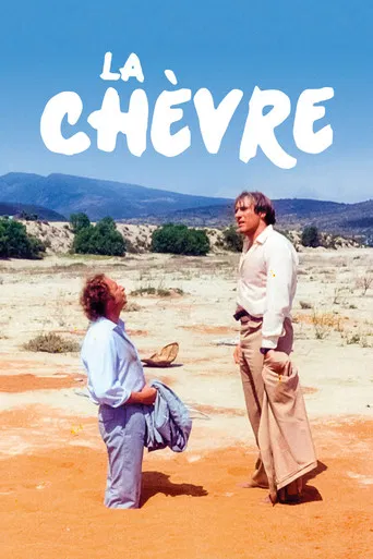 The poster features two men in a desert landscape, with one holding a bag and the other standing confidently. The warm tones of the sand and the vibrant colors of their clothing create a sense of adventure and camaraderie.