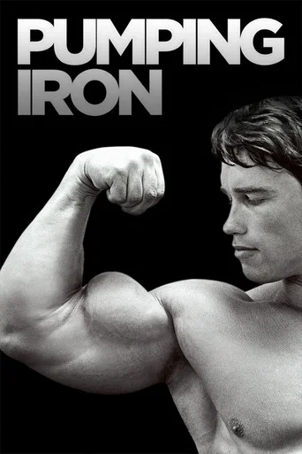 The poster features a muscular man flexing his bicep against a stark black background, exuding strength and confidence. Bold white text reads "PUMPING IRON" at the top, emphasizing the movie's theme of physical fitness and determination.