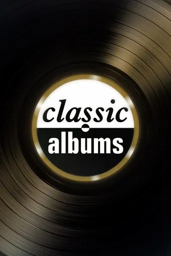 The poster features a classic vinyl record in the center, surrounded by swirling golden light. The words "classic albums" are elegantly written in white against the dark background. The mood is nostalgic and timeless, evoking the essence of timeless music.