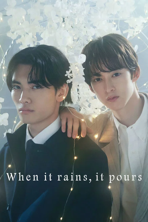 Two young men stand against a dreamy, snowy backdrop, their expressions conveying a mix of melancholy and hope. The warm glow of fairy lights adds a cozy, magical atmosphere to the scene, while the soft, ethereal colors evoke a sense of wonder and introspection.