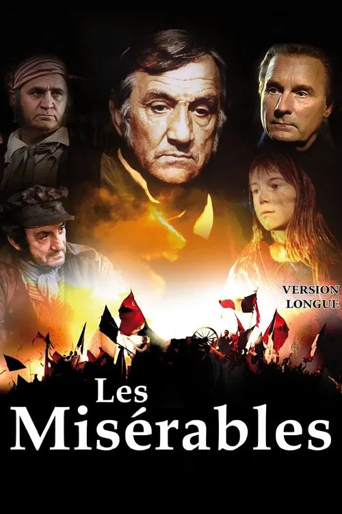 The poster features a dramatic composition with a central figure of a man against a fiery backdrop, surrounded by other characters in various emotional states. The warm orange and yellow tones evoke a sense of urgency and passion, while the dark silhouettes of the crowd below suggest a chaotic an...