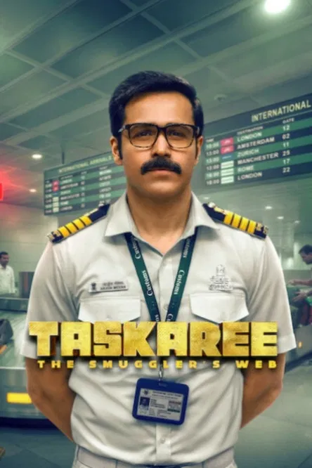 The poster features a determined actor in a police uniform against a gritty, smoky background, conveying action and urgency. The muted tones of the uniform contrast with the fiery sparks, suggesting high-stakes action. The title "Taskaree: The Smuggler's Web" hints at a complex narrative involvin...