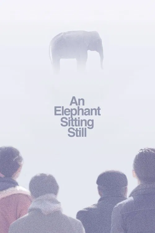 The poster features silhouetted figures of people watching a large, ghostly elephant head against a misty, ethereal background. The muted colors and soft lighting evoke a sense of mystery and quiet contemplation, capturing the essence of a timeless, serene moment.