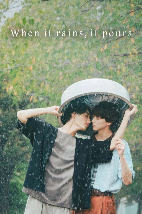 Two young men stand against a dreamy, snowy backdrop, their expressions conveying a mix of melancholy and hope. The warm glow of fairy lights adds a cozy, magical atmosphere to the scene, while the soft, ethereal colors evoke a sense of wonder and introspection.