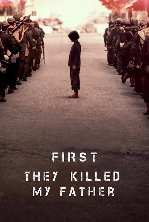 The poster depicts a somber scene with a lone figure standing alone in the center of a vast, dusty road flanked by rows of soldiers. The muted, sepia-toned palette and the stark contrast between the solitary protagonist and the surrounding military presence evoke a sense of tragedy and historical...