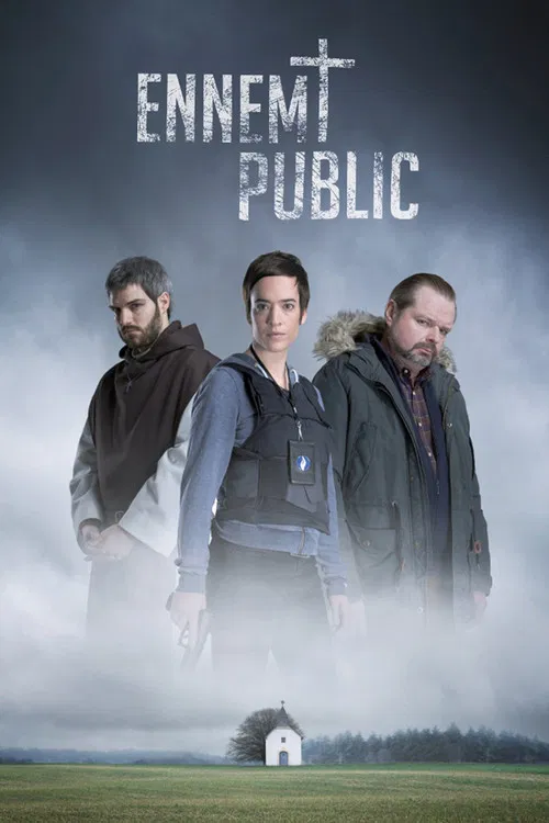 The poster features three rugged men in muted earth tones against a stormy, misty sky. A solitary white house sits in the foreground, evoking isolation and mystery. The title "ENEMET PUBLIC" is boldly displayed at the top, suggesting themes of betrayal and public scrutiny.