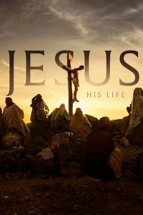 The poster features silhouettes of people in a desert landscape against a dramatic sunset, with Jesus standing atop a rock, symbolizing his crucifixion. The warm, golden hues evoke a somber yet hopeful mood, emphasizing the gravity of his life's journey.