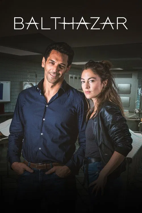 The poster features a man and woman in dimly lit, moody lighting with warm tones. The man in a dark shirt and the woman in a leather jacket stand close together, exuding a sense of mystery and intrigue. The title "Balthazar" is prominently displayed at the top, suggesting a dramatic or supernatur...