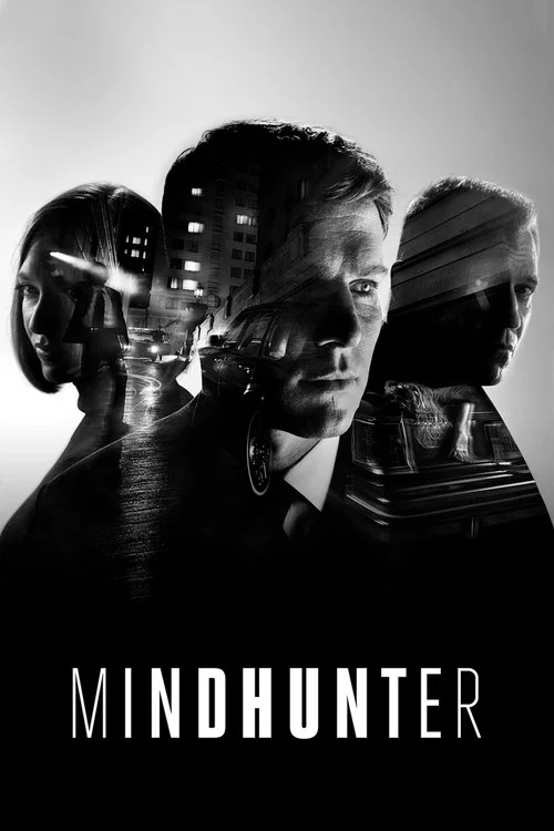 The poster features a dramatic, monochromatic image of four men in black and white, with one central figure wearing a suit while the others are shirtless. The title "MINDHUNTER" is prominently displayed at the bottom. The overall mood is intense and suspenseful, with a gritty, noir aesthetic that...