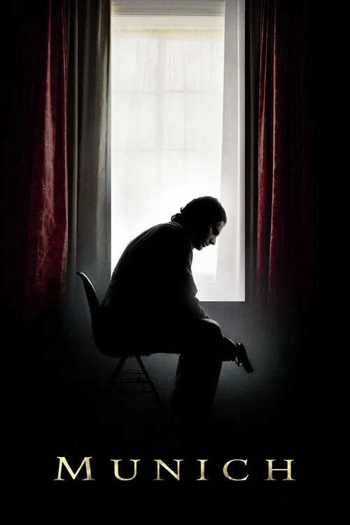 The poster features a silhouetted figure sitting alone at a window, bathed in soft, warm light. The dark red curtains frame the scene, creating a moody atmosphere. The title "MUNICH" is elegantly placed at the bottom in gold lettering.