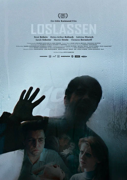 The poster features a somber, muted color palette dominated by cool blues and greys. A man in a dark suit stands with his hand raised, while two women look on with concerned expressions. The title "LOSLASSEN" is prominently displayed in bold, white letters at the top, evoking a sense of melanchol...