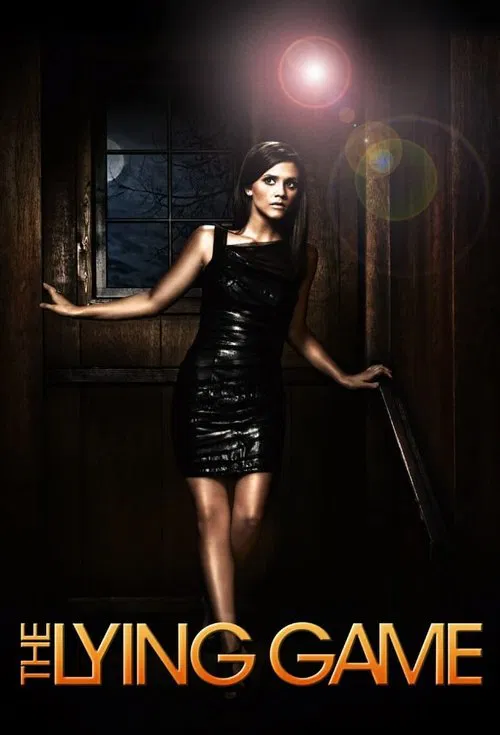 A woman in a black dress stands against a dark, moody background, her pose suggesting mystery and intrigue. The poster uses dramatic lighting and shadowy tones to create an atmosphere of suspense. The title "The Lying Game" is prominently displayed at the bottom, hinting at a game of deception an...