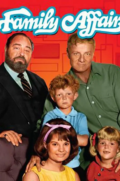 The poster features a family of four—two adults and three children—standing against a warm red brick wall. The adults wear suits and shirts, while the children are dressed in colorful outfits. The mood is cheerful and familial, with the show's title prominently displayed in bold blue letters at t...
