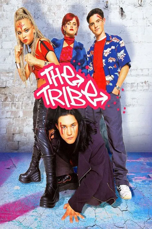 The poster features four individuals in vibrant, eclectic clothing against a textured brick wall, exuding a rebellious and artistic vibe. The bold pink title "THE TRIBE" stands out prominently, while the colorful floor adds to the dynamic energy.
