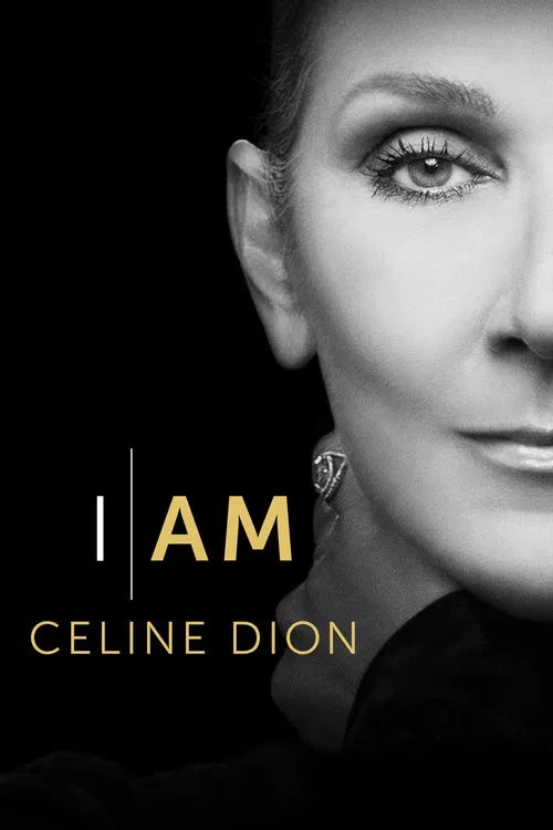 The poster features a close-up of Celine Dion's face in a monochrome setting, exuding elegance and mystery. The bold text "I AM" in gold stands out against the dark background, while her elegant earrings add a touch of sophistication. The overall mood is one of timeless glamour and confidence.